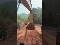Excavators Load Soil Onto Trucks