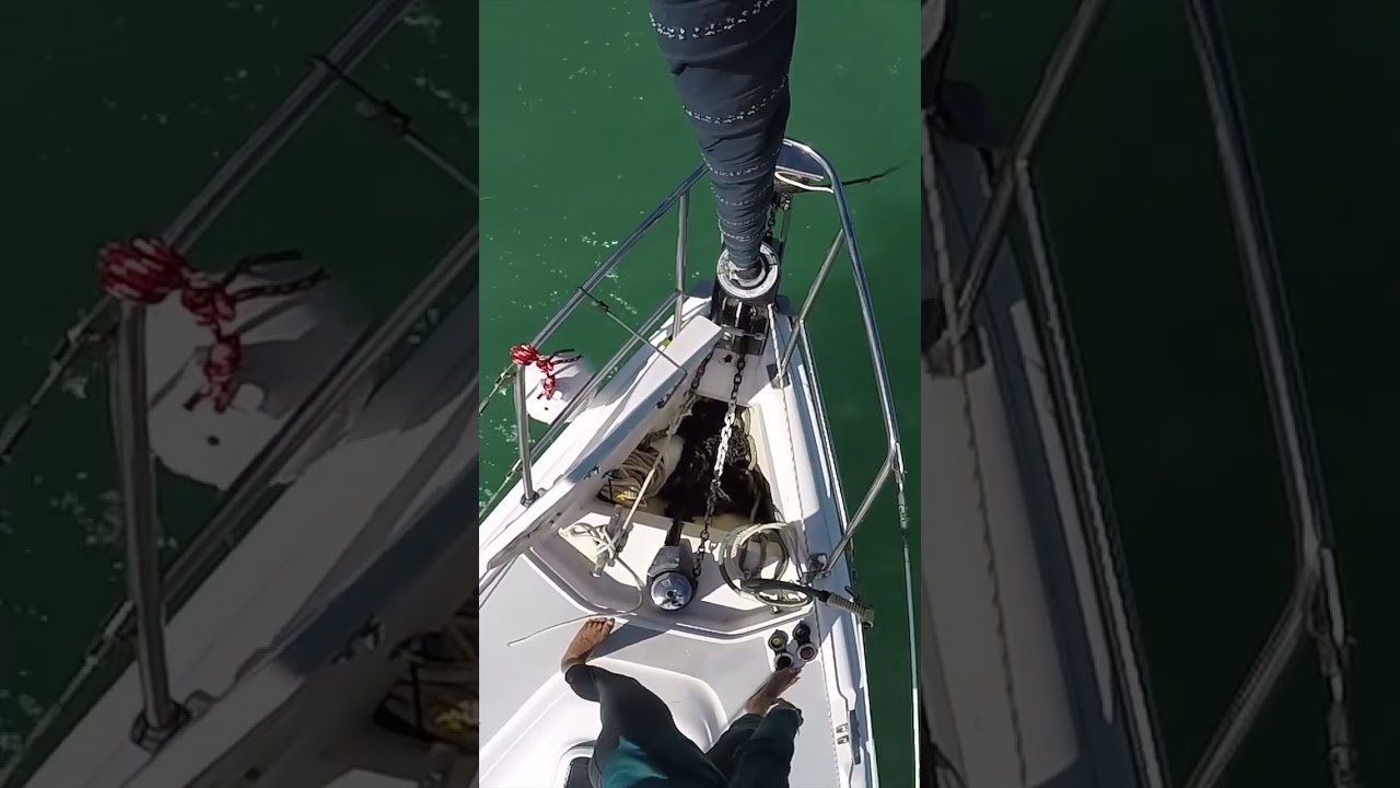 Lisa learns how to pull up the anchor on their sailboat #shorts #sailingbyefelicia #windlass