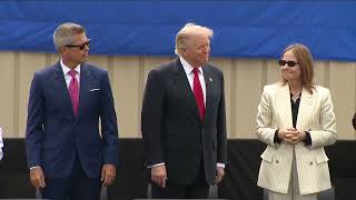 Trump watches a drag race at General Motors in Michigan