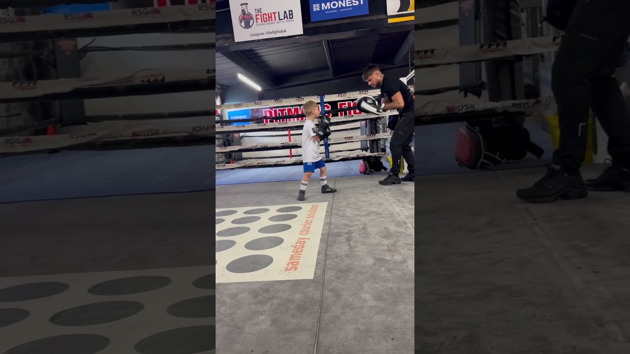 Jay Pitman and Chase the Ace pad work for the first time on his 5th birthday 