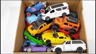 Box full of Model Car Jaguar, Nissan, Audi, Maserati, Peugeot, Volvo, Renault ,Daihatsu,