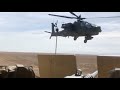 Slow Mo Footage of Apache Gunship Buzzing US Convoy In Syria