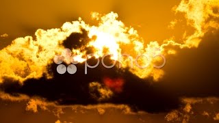 Setting Sun Through Beautiful Fiery - Like Clouds. Stock Footage