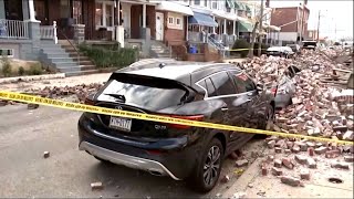 Strong Thanksgiving Day winds blamed for brick wall collapsing onto cars in West Philadelphia