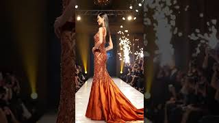 the elegant on this orange beaded gown. best for the runway and pageantry #beadeddress #derbylaces