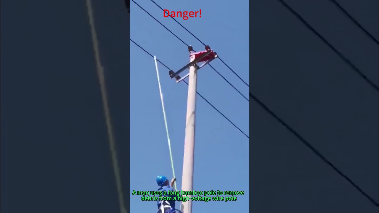 Danger! Man Pokes HV Wire Pole w/ Bamboo | Electrical Safety & Construction Risks