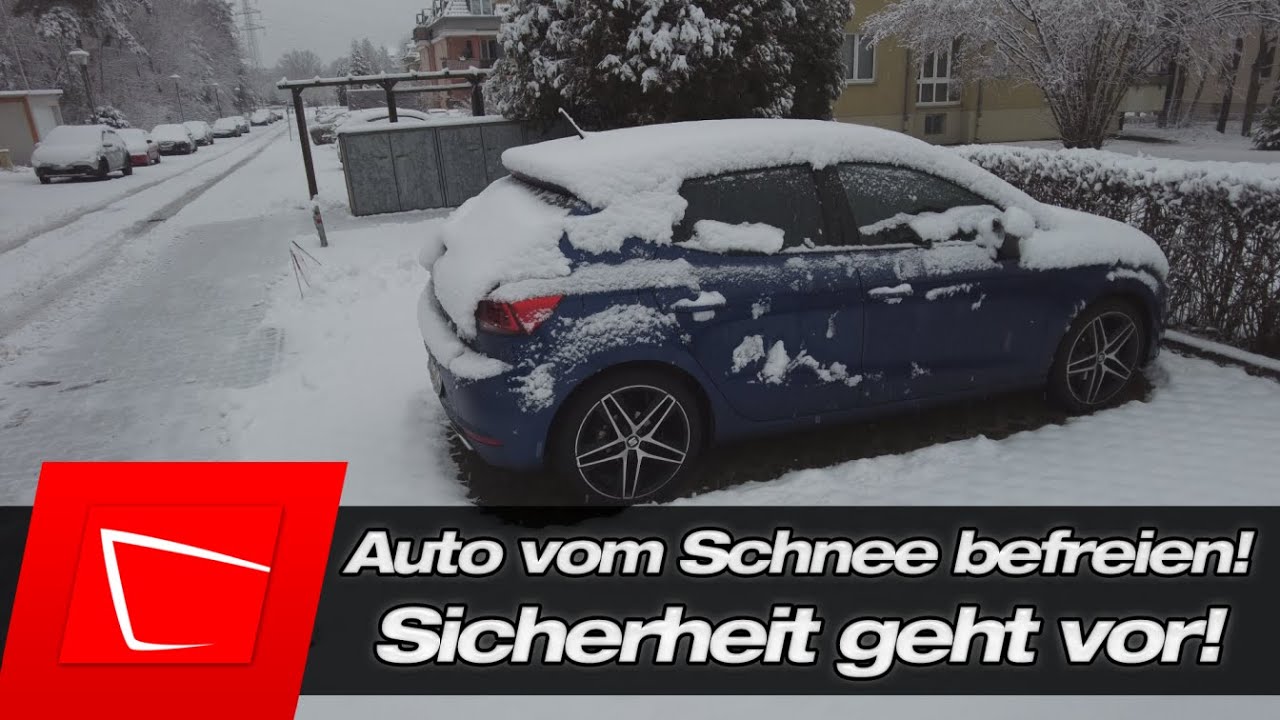 Auto von Schnee befreien - Schnee entfernen mit Schneebesen - APA