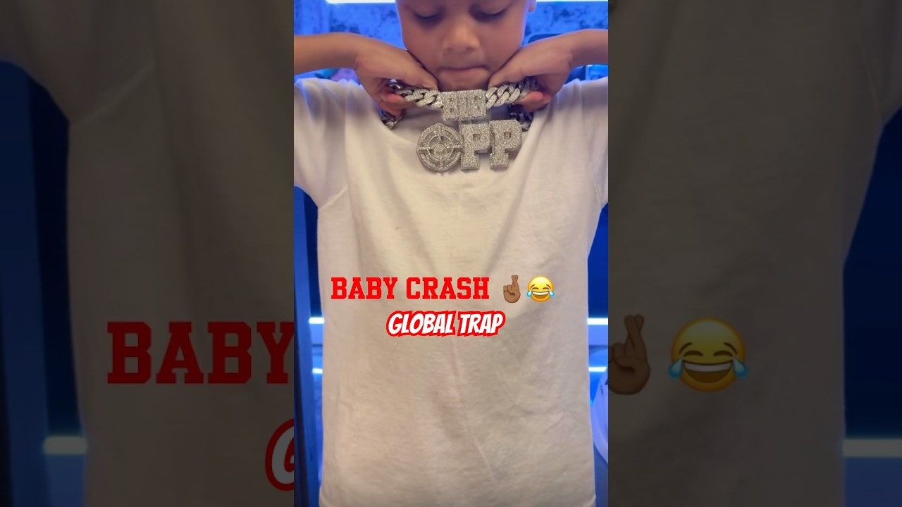 G HERBO SON WEARING BIG OPP CHAIN