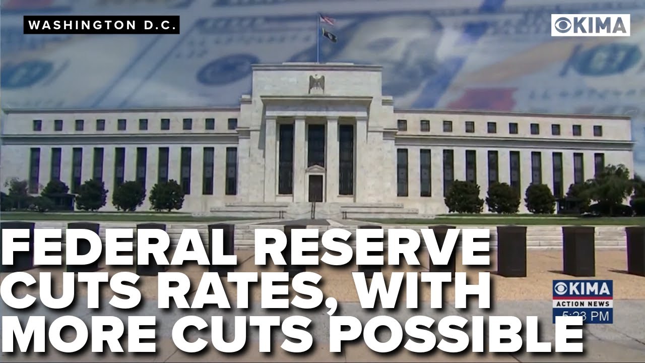 Federal Reserve cuts interest rates by quarter-point - YouTube