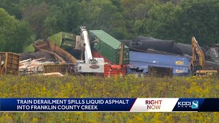 Train derailment spills asphalt into creek near Hampton