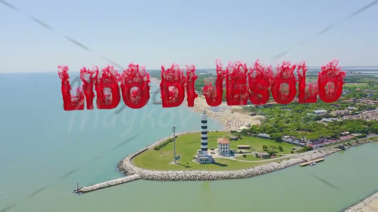 Inscription on video. Italy, Jesolo. Light House Faro di Piave Vecchia. Lido di Jesolo, is the beach