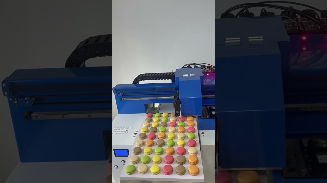food printer printing patterns on the surface of macarons. After printing the food becomes high-end