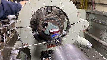 Co-ax on lathe, dial that part into the steady rest the easy way. 