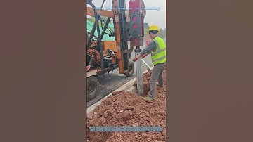 Workers Precisely Position Highway Corrugated Guardrails