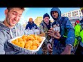 Handing out 50 hot meals to the homeless 