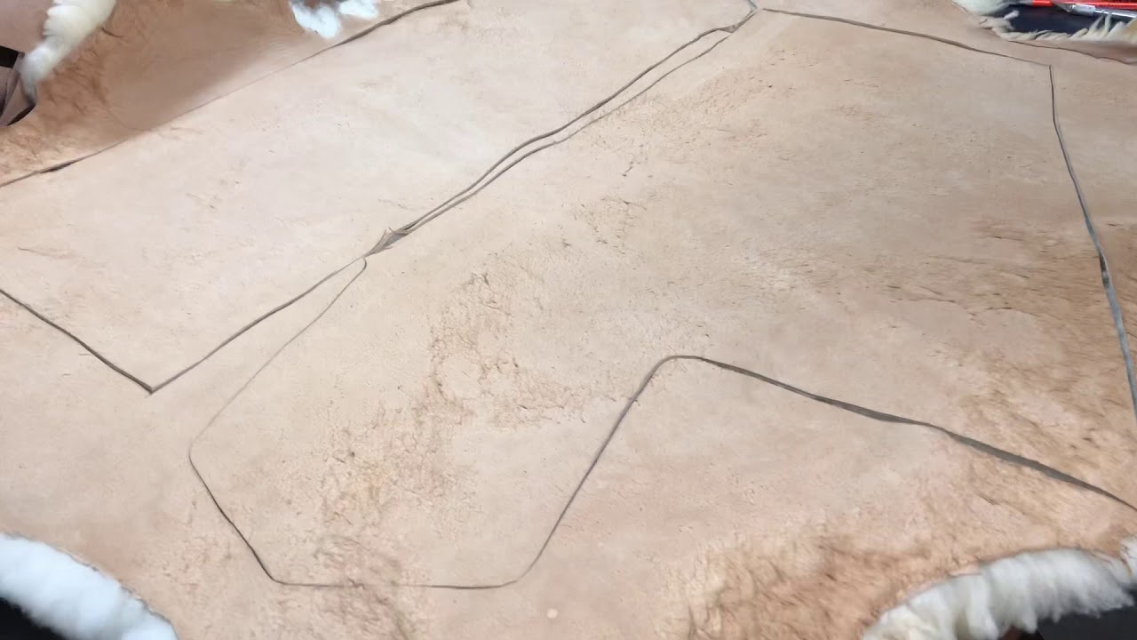 Cutting sheepskin rifle case