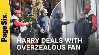 Moment Harry Styles has heated exchange with aggressive autograph seeker on NYC street