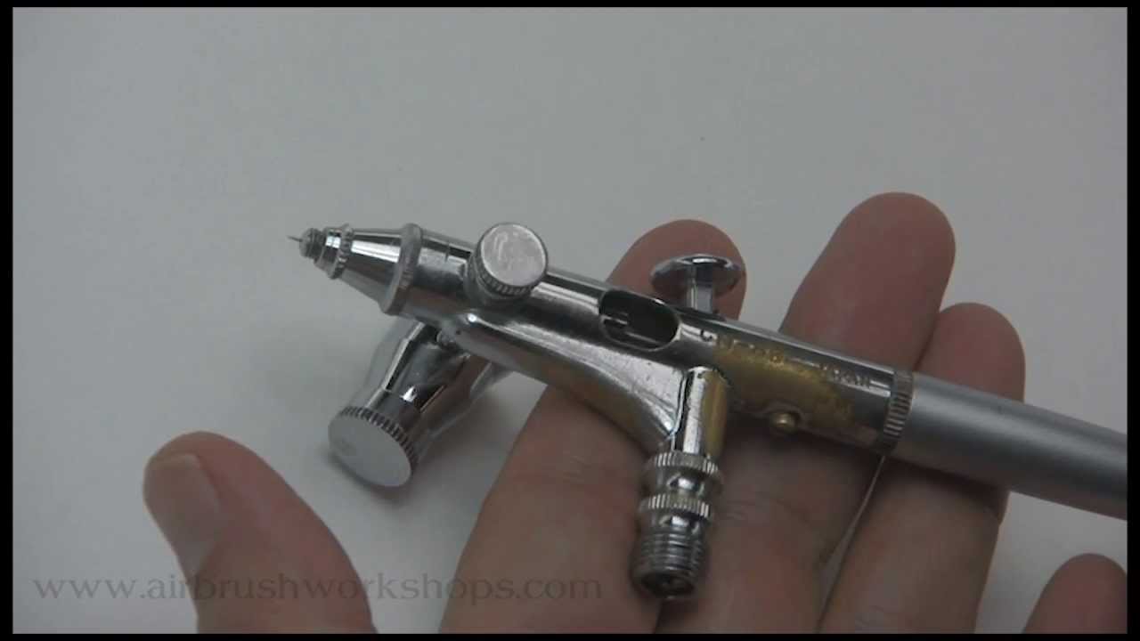 Dru Blair shows proper hand position with the airbrush after a spring