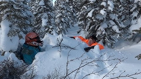 How to unstuck your snowmobiler friend.  PowerModz Style.