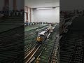 HO Gauge train speeds over a Level Two Crossover and around the bend
