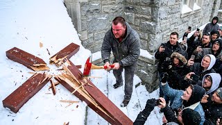 Protester Atheist smashes CROSS with his AX... then COLLAPSES