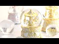 Gorgeous golden merry-go-round Music Snow Globe.  good-goods-online.com