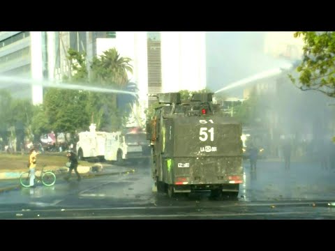 Chilean police disperse protesters with water cannons ahead of vote | AFP