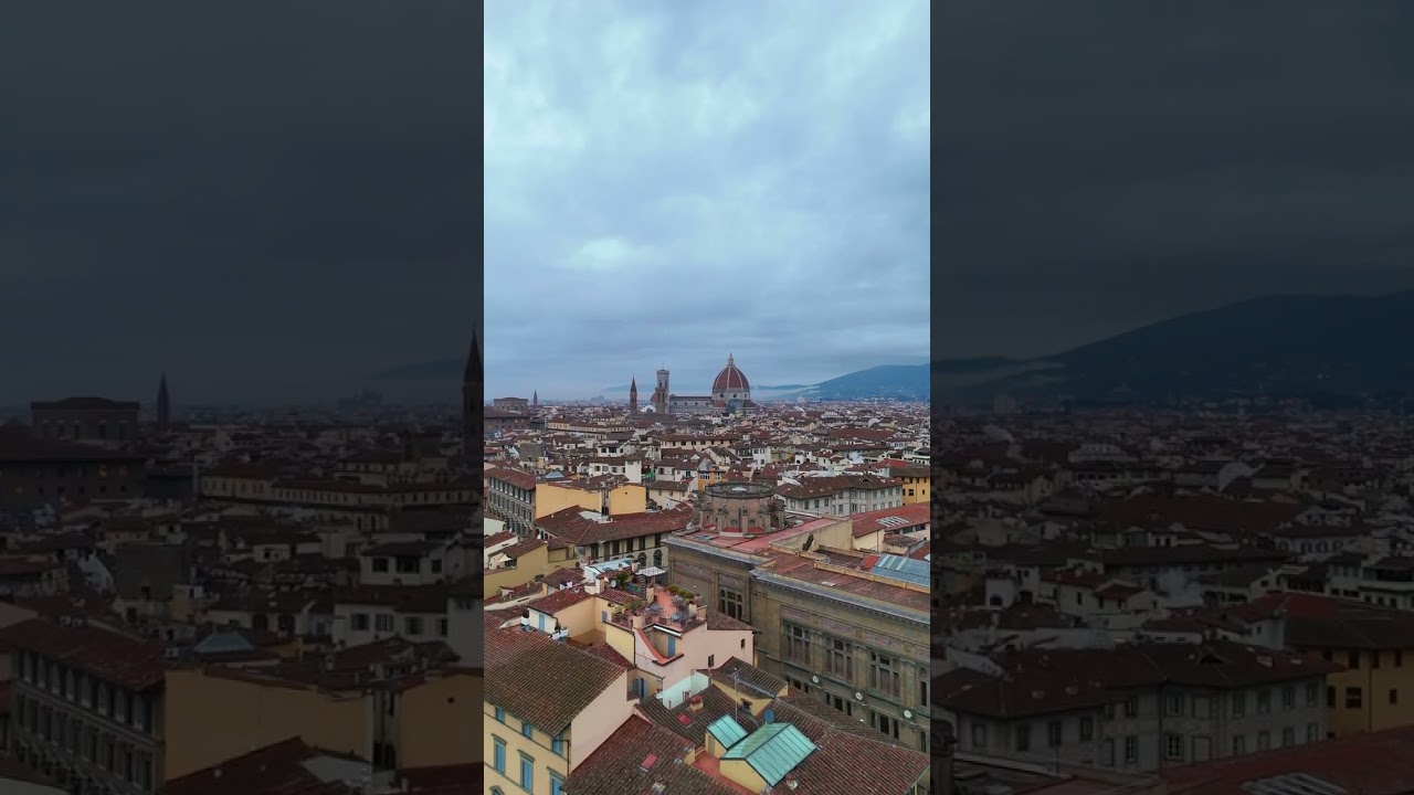 Florence Rooftops at Dawn: Moody Skies Above the Duomo 