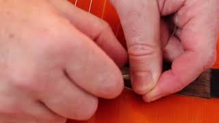 How to restring a Spanish/classical/flamenco guitar.