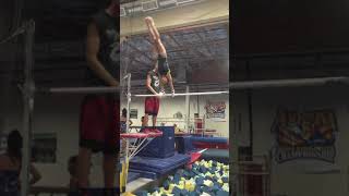 Training double back dismount on bars