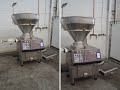 1486-35: Handtmann vacuum filling machine with lifter for 200 liter meat bins