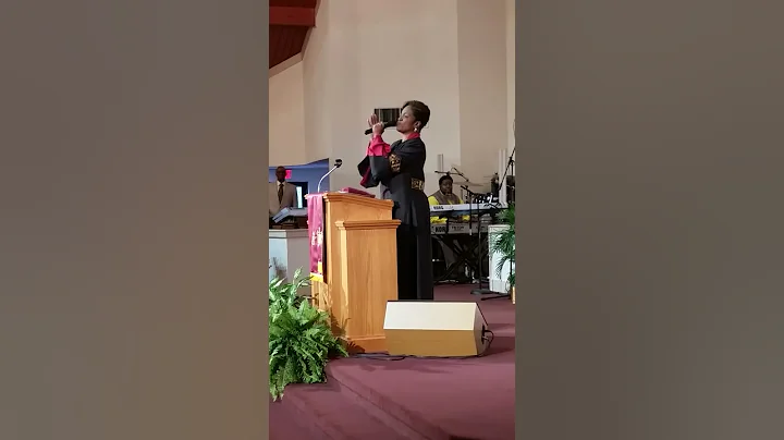 Pastor Moore singing "Be Grateful "