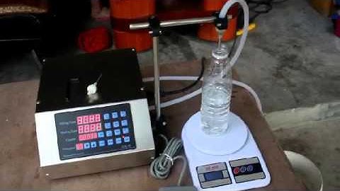test run video of semi automatic tabletop numerical liquid filling machine