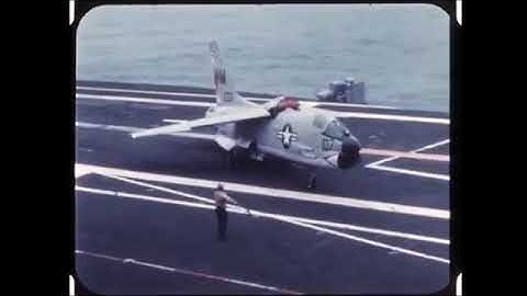 US Navy F-8 Crusader landing on USS Midway (CV 41)