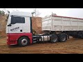 MAN TGX 29.480 (480cv) 6x4 no bi-caçamba chegando carregado e descarregando