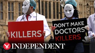 Masked medics join anti euthanasia protest outside parliament