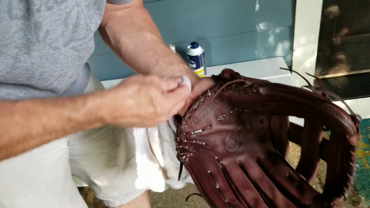 Breaking in a new baseball glove YouTube