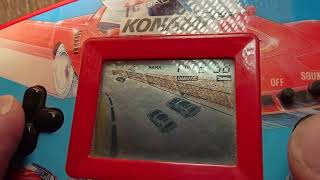 Historic handheld game console Konami racing 60FPS 4K