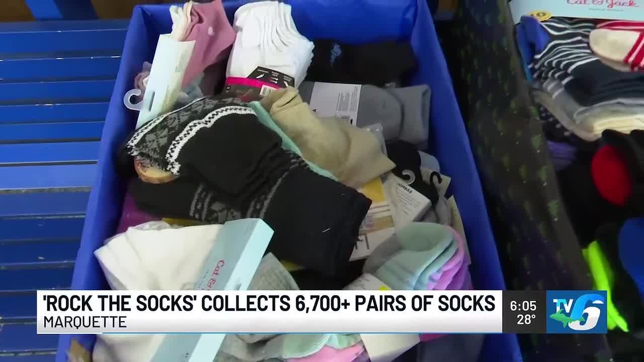 Marquette Alternative High School students collect 6,700 pairs of socks for donation