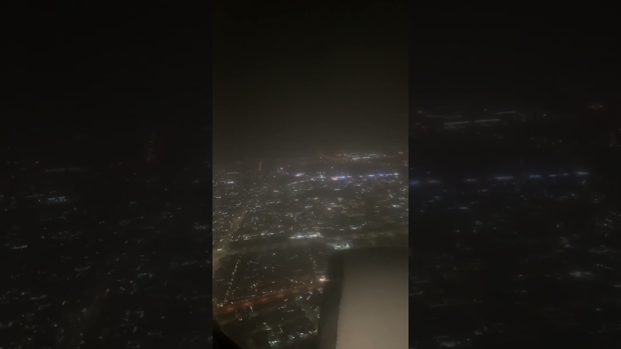 Dubai airport landing night view 
