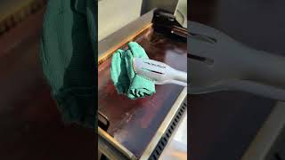 Cleaning the griddle