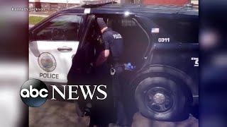 Fallout over viral video of police officer putting 8-year-old boy into back of cruiser