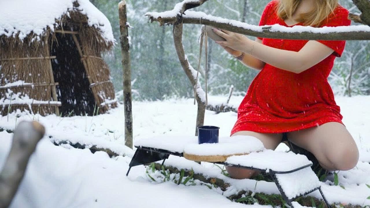 Beautiful Woman Camping Alone in Winter in a Little Reed Hut - Female Camping