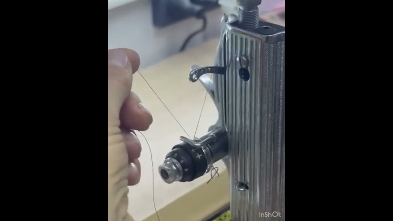 Enhebrado Singer negrita 