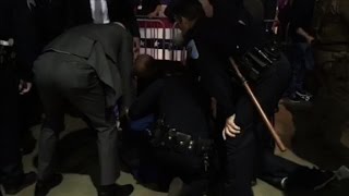 Video shows police escorting man away after incident