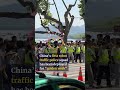 Hangzhou’s ‘robocops’ direct tourist traffic