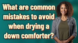What are common mistakes to avoid when drying a down comforter?