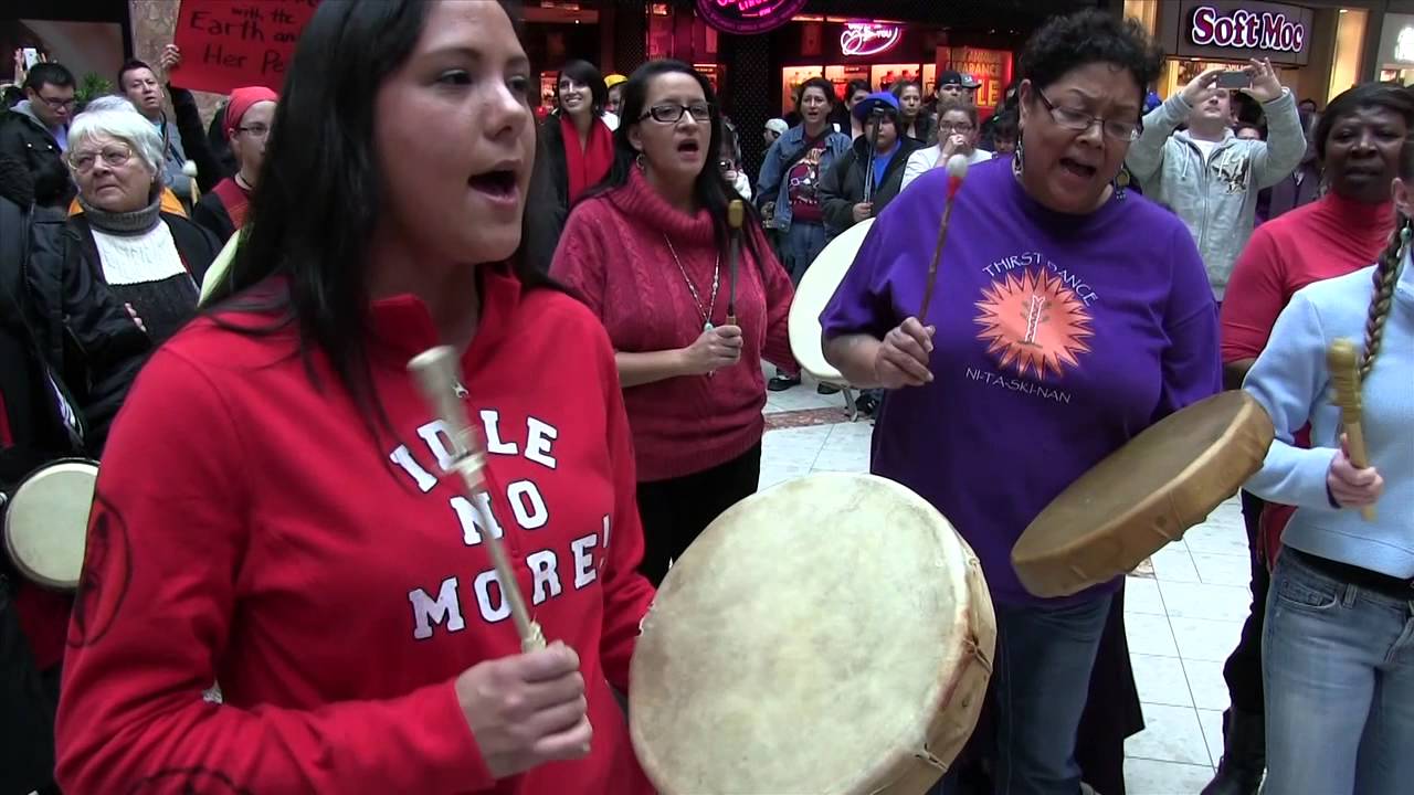 Idle No More: Flash Mob Soloist sings Honor Song