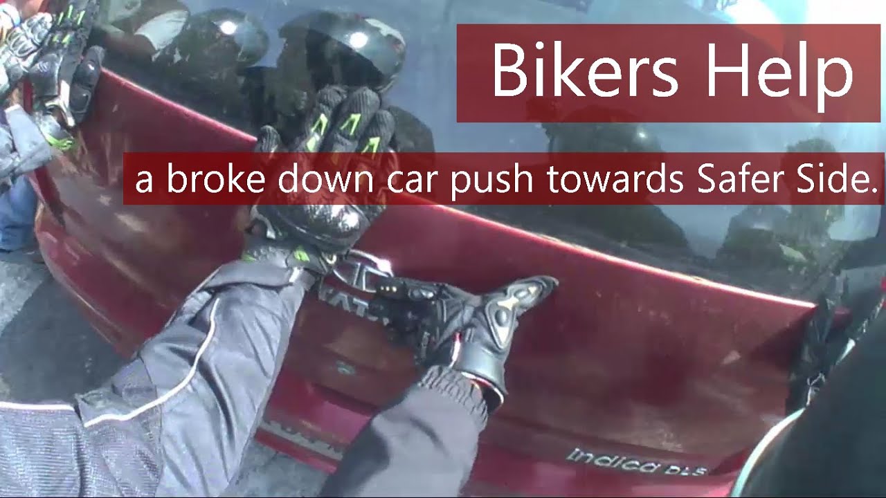 Bikers helping | Pushing a brokedown car towards safer side