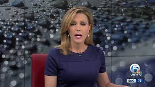 Heavy rain causes drivers to become stuck on flooded streets in West Palm Beach
